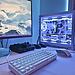 Guía: Como armar una PC Gamer - gabinete blanco con panel de vidrio, ventiladores RGB, GPU y cableado ordenado, junto a monitor, teclado y mouse.