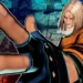 Fatal Fury fighting game artwork showing a blonde SNK fighter in an orange jacket reaching toward the camera in a dynamic action pose.