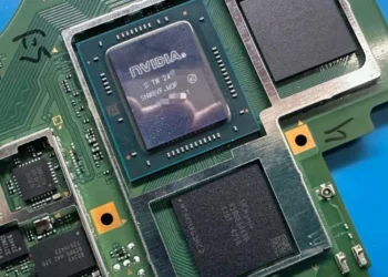 GPU Nintendo Switch 2 - Close-up of Nvidia GPU on Nintendo Switch 2 motherboard, showing graphics processor and memory chips on a green PCB.