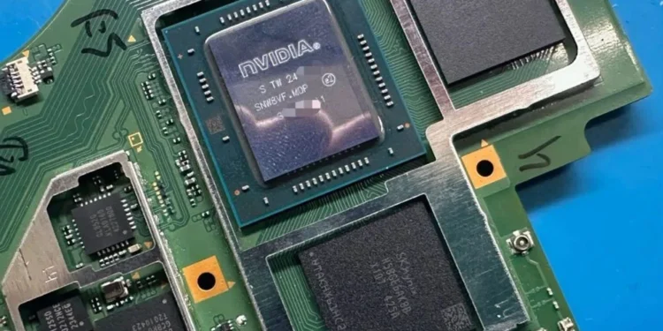 GPU Nintendo Switch 2 - Close-up of Nvidia GPU on Nintendo Switch 2 motherboard, showing graphics processor and memory chips on a green PCB.