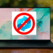 Windows Recall - Windows 11 laptop showing a crossed-out Windows Recall icon, symbolizing how to disable Windows Recall for privacy and security concerns.