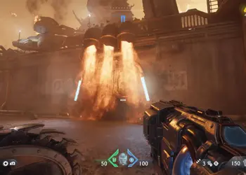 Secreto Puerta de Fuego en Doom The Dark Ages: vista en primera persona con compuerta cubierta de llamas que bloquea el paso, guía para abrirla.
